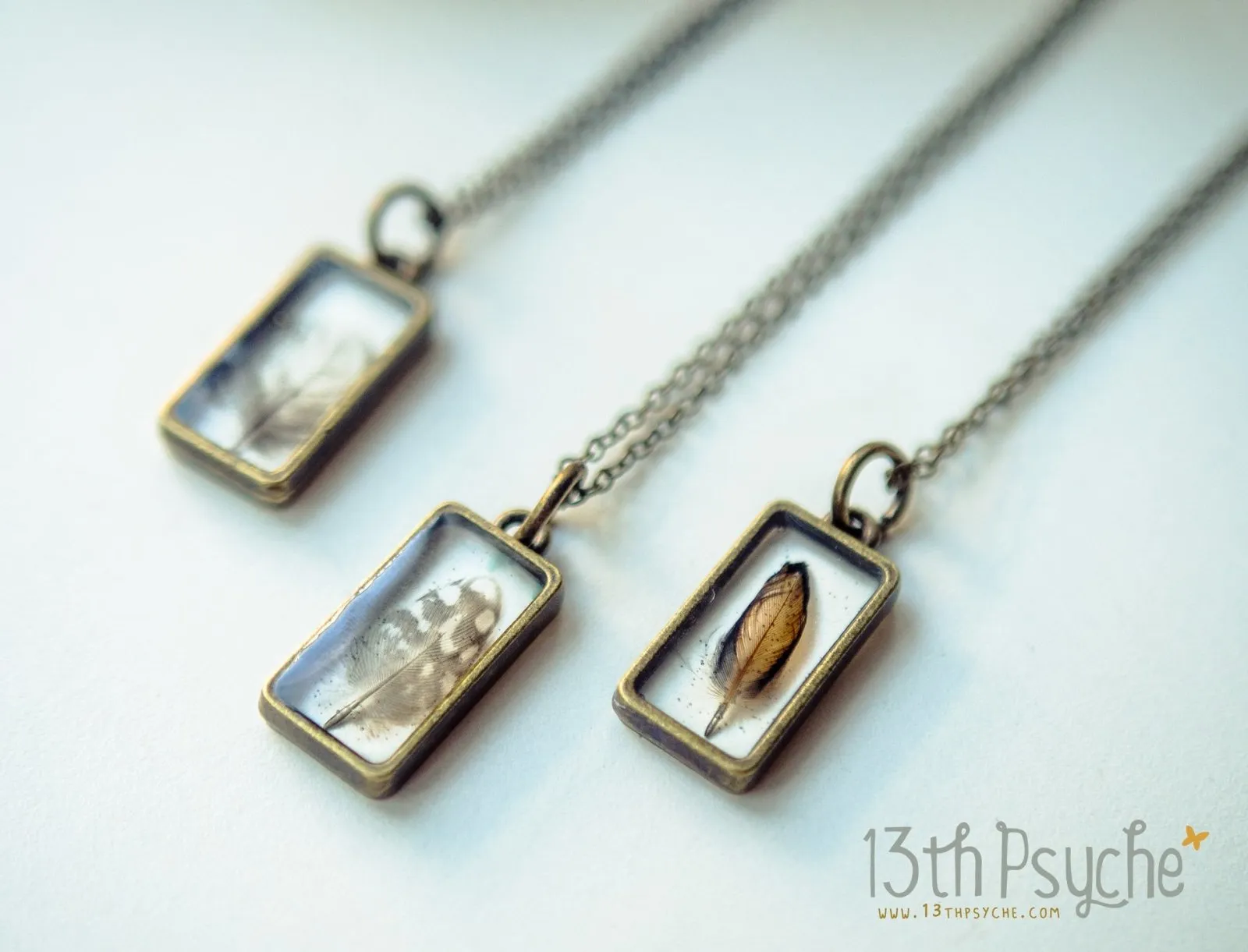 Square shaped resin pendant with real tiny feather necklace