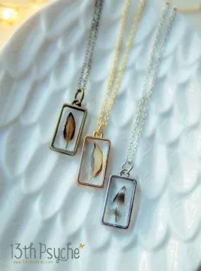 Square shaped resin pendant with real tiny feather necklace