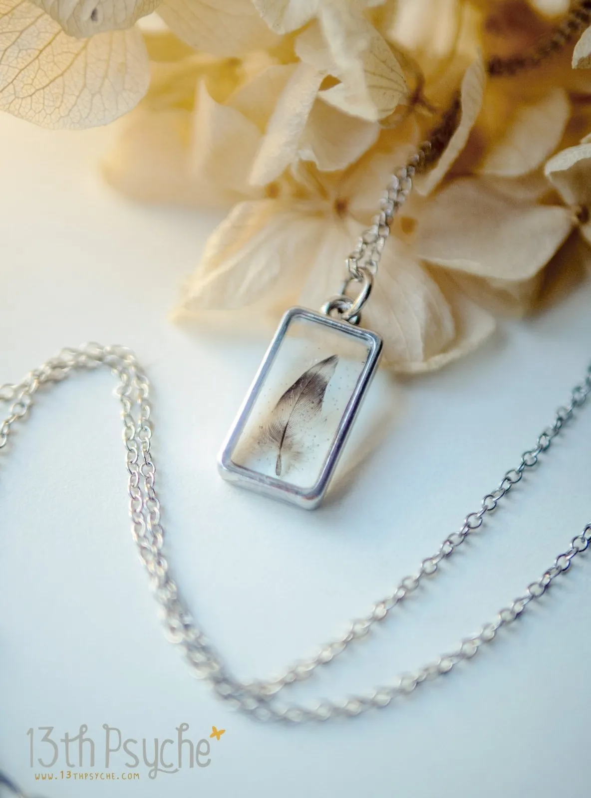 Square shaped resin pendant with real tiny feather necklace